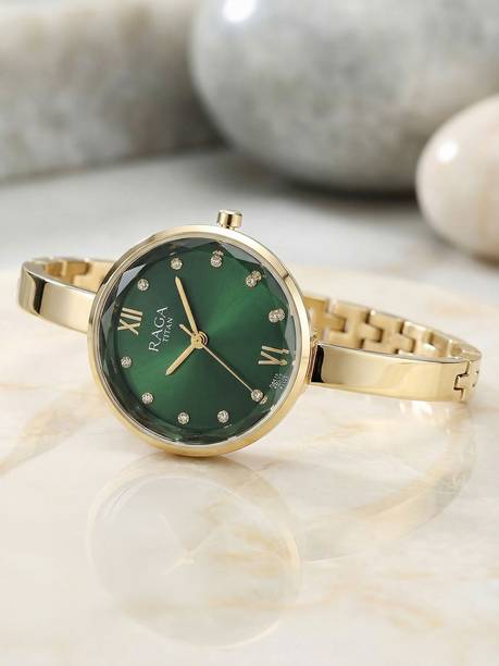 Titan Raga Showstopper Green Dial Gold MetalStrap Analog Watch - For Women NT95271YM01,95271YM01,NU95271YM01