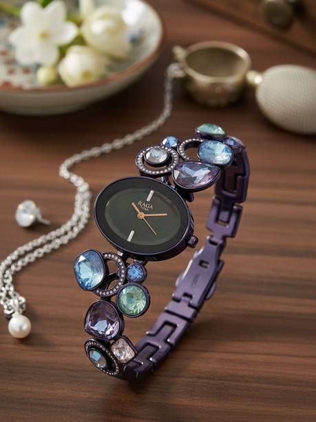 Titan Raga Moments Of Joy Blue MOP Dial Purple MetalStrap Analog Watch - For Women NT95126QM01F,NT6296WM02,95126QM01F,NU95126QM01F