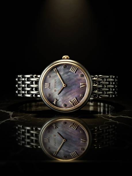 Titan Aura Multicolour MOP Dial Grey Stainless Steel Strap Analog Watch - For Women NT95243KM01