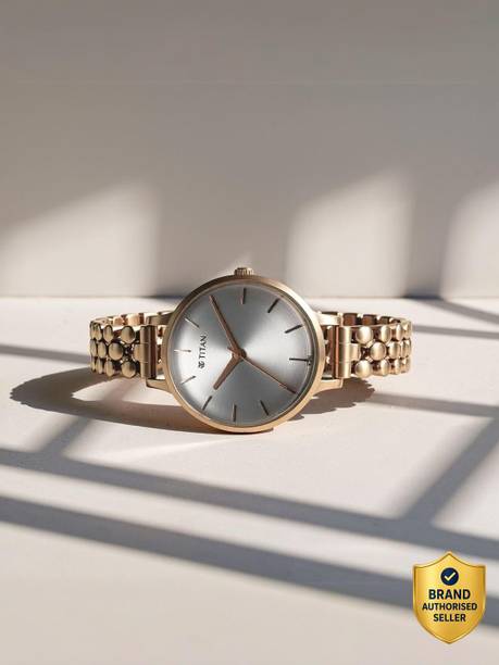 Titan Secluded Silver Dial Rose Gold MetalStrap Analog Watch - For Women 2709WM02,NU2709WM02