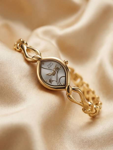 Titan Raga Flora Silver Dial Gold Metal Strap Analog Watch - For Women NT2455YM01,NU2455YM01