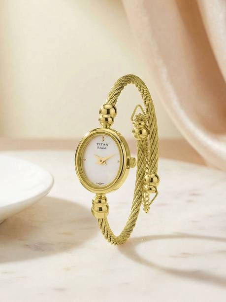 Titan Raga White Dial Gold Stainless Steel Strap Analog Watch - For Women NT1802SM02,1614NP01,1802SM02,NU1802SM02,NU197YM04