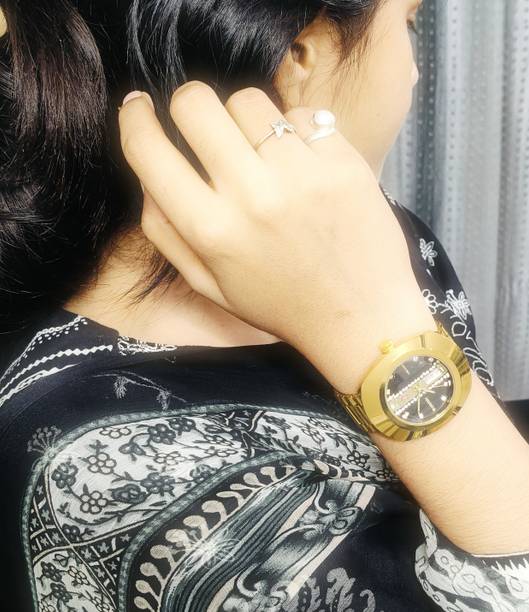 QUANTEX RADU Elevate your everyday style with this elegant Quantex Analog Date Display Analog Watch  - For Women