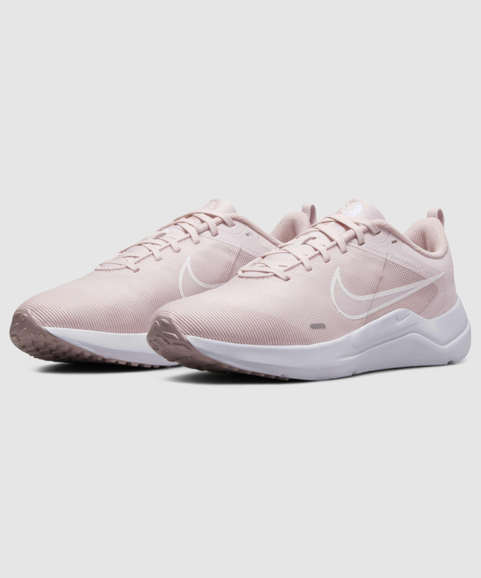 nike running renew run sneakers in rose gold