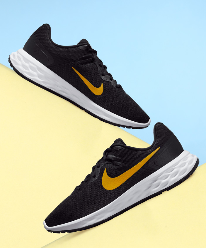Nike Revolution Nike Womens Black And Gold Running Shoes NIKE