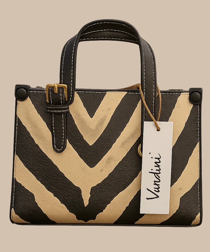 https://rukminim2.flixcart.com/image/704/844/xif0q/sling-bag/j/o/p/bold-vegan-leather-handbag-for-women-chevron-printed-trendy-original-imahegfgjvmqfzpt.jpeg?crop=false&q=90