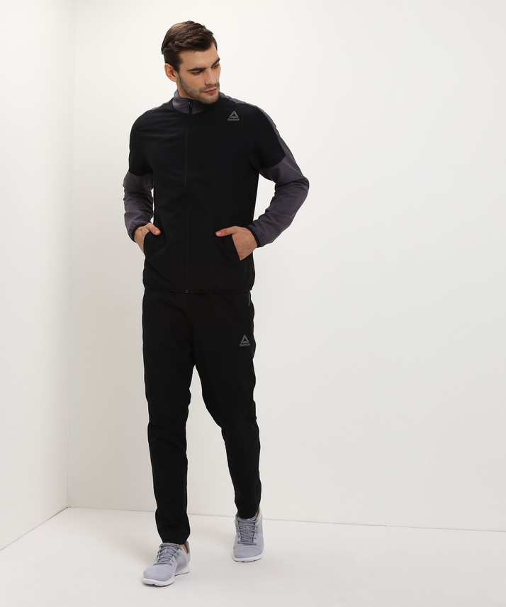 reebok solid men tracksuit