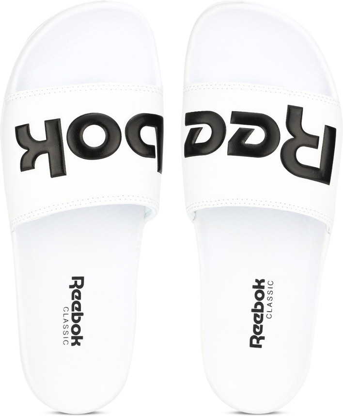 white reebok slides