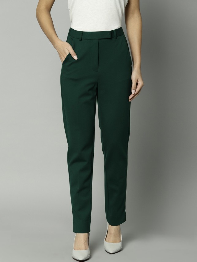 green slim trousers