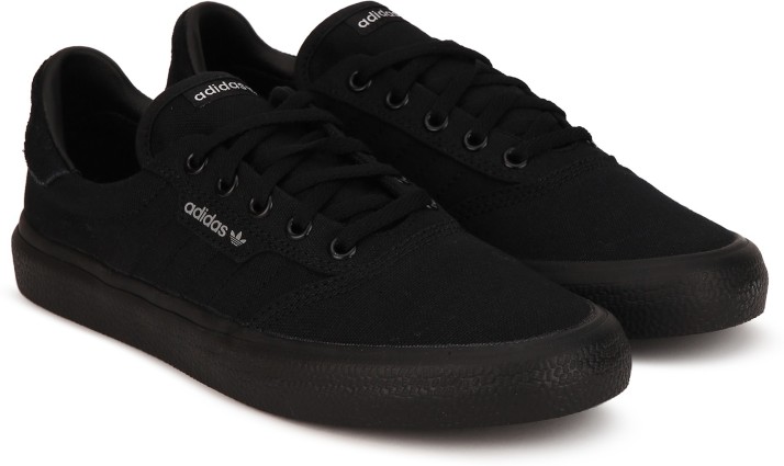 adidas black canvas trainers