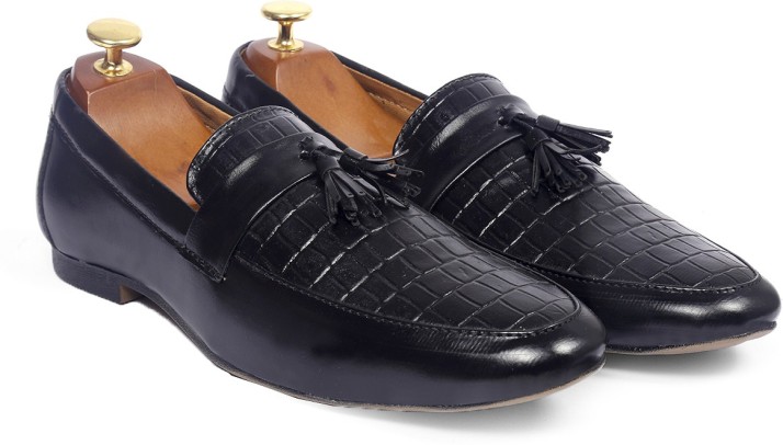 shining black loafers