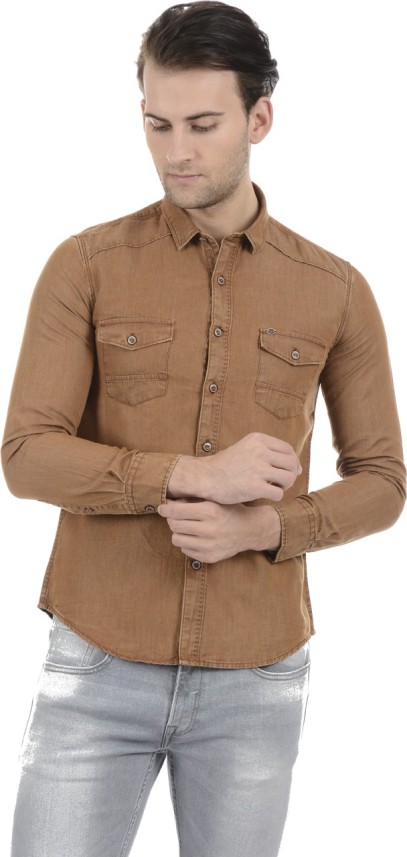 blue jeans brown shirt