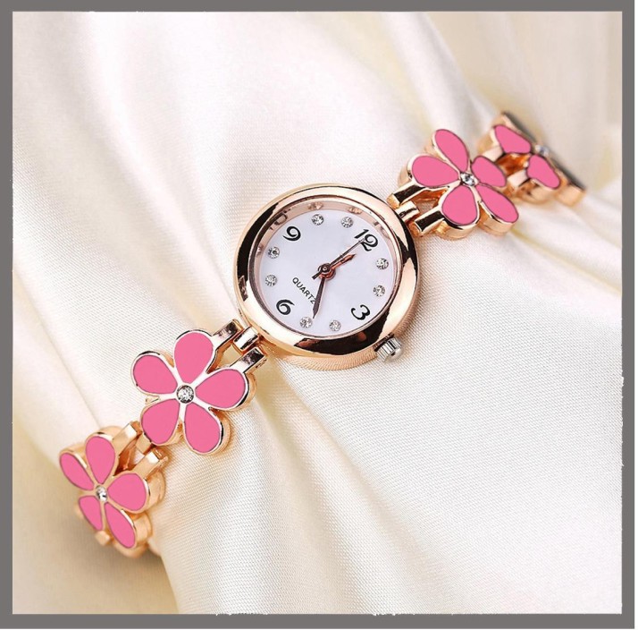 gold and pink watch