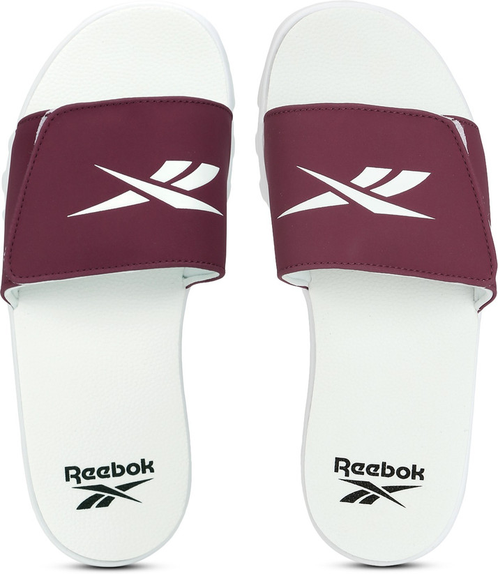 white reebok slides