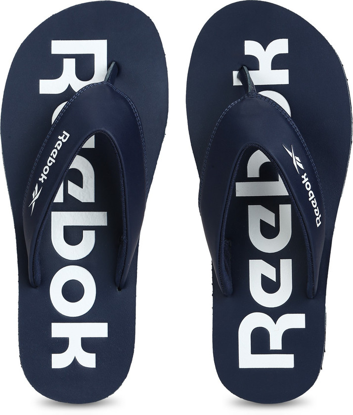 reebok flip flops white