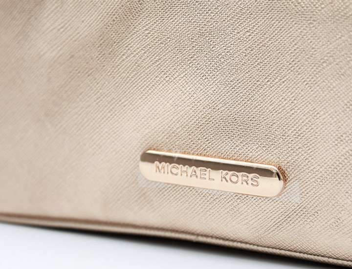 Michael kors gold makeup bag online