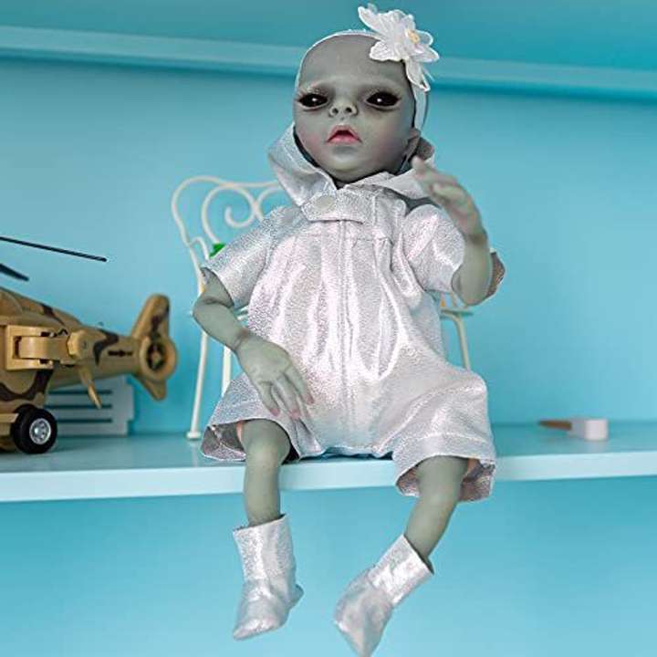 Realistic alien baby doll outlet