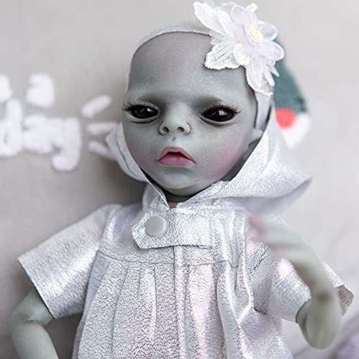 Realistic alien doll clearance