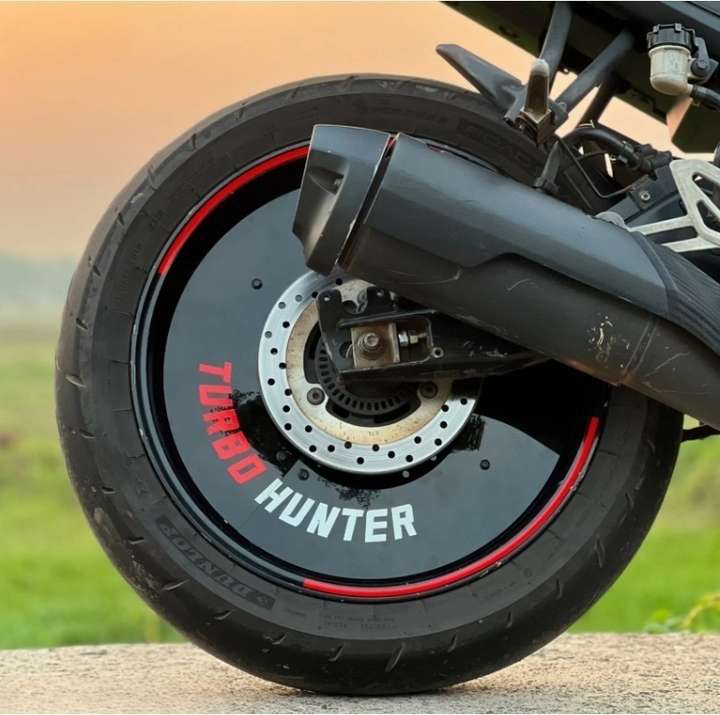 Motorcycle wheel disc cover outlet