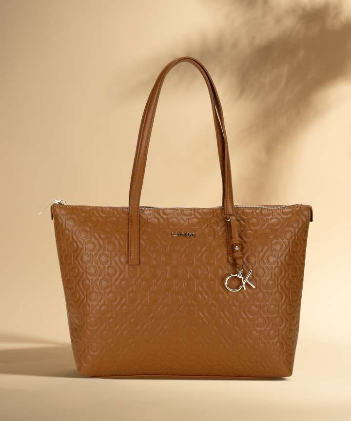 Buy Calvin Klein Women Brown Hand held Bag Brown Online Best Price in India Flipkart