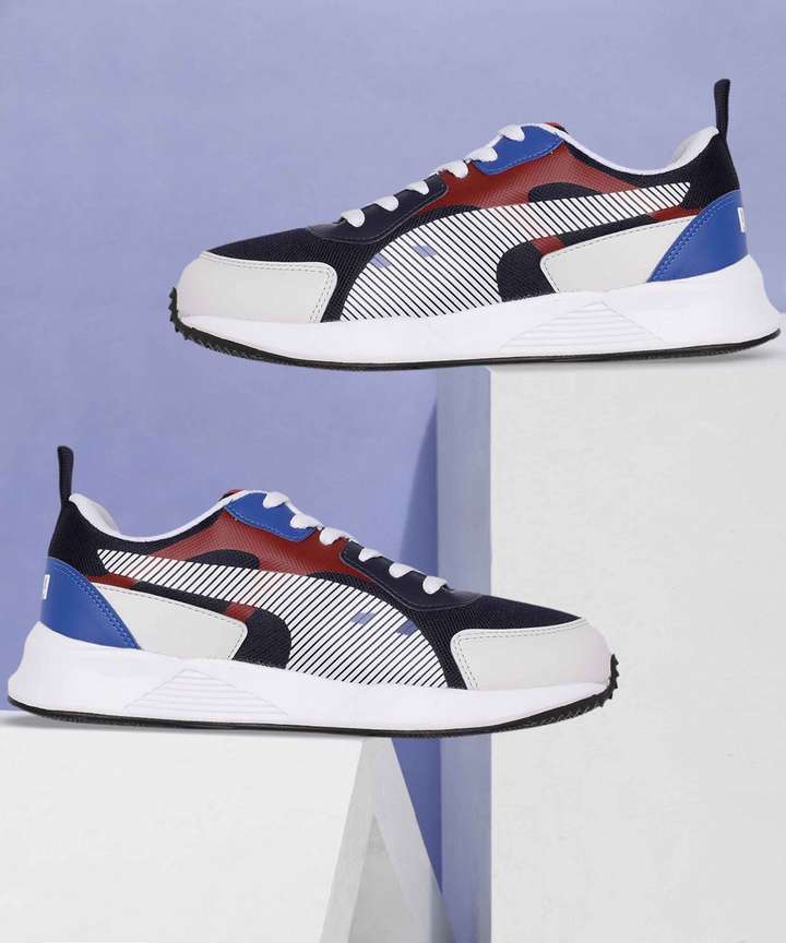 Navy blue and white pumas store