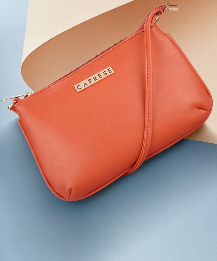 Caprese Orange Sling Bag Shyla Sling Small Orange Orange Price in India Flipkart