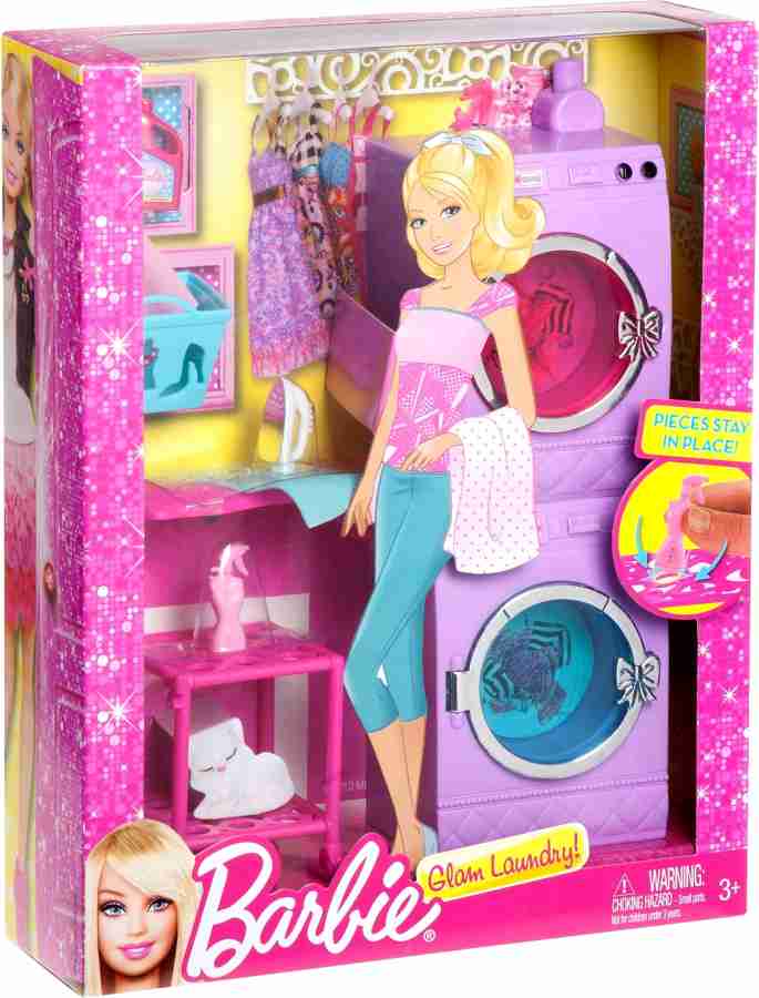 Homemade Barbie doll house spinning washer and dryer.