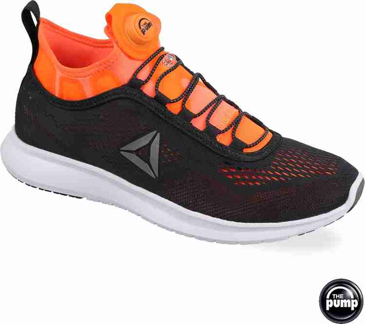 Orange cheap reebok pumps