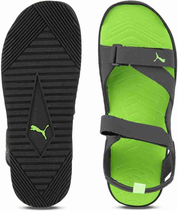 Puma black and green flip flops hotsell