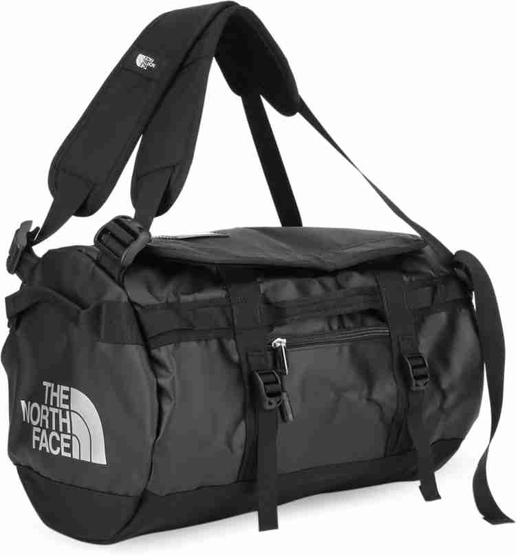 Orange north face duffel bag hot sale