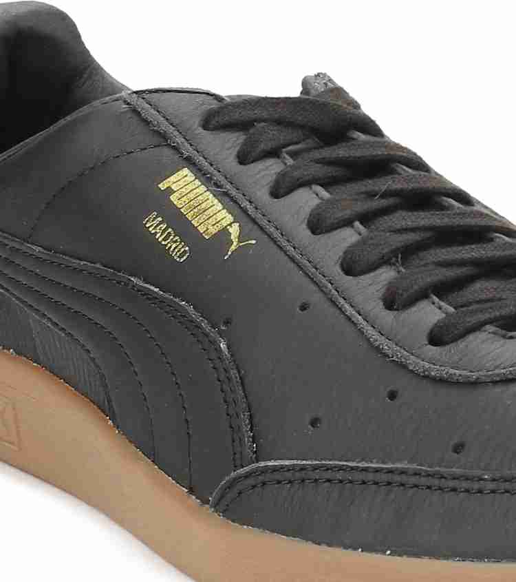 Black puma best sale leather trainers