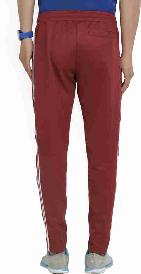 Adidas sst track pants maroon hotsell