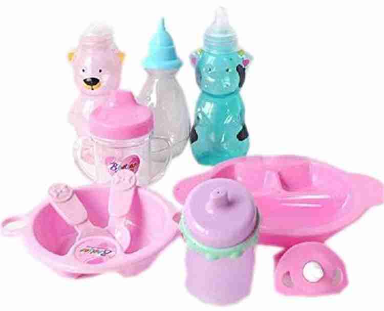 Doll with pacifier and bottle on sale