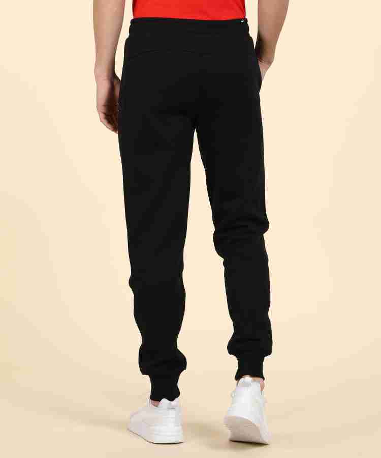 PUMA Essentials Fleece Pants Solid Men Black Track Pants - Buy