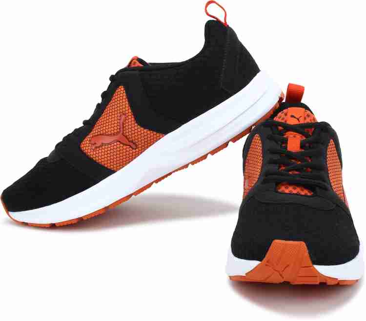 Orange black online puma shoes
