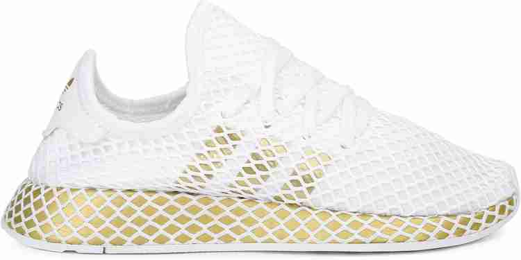 Adidas deerupt white and gold store