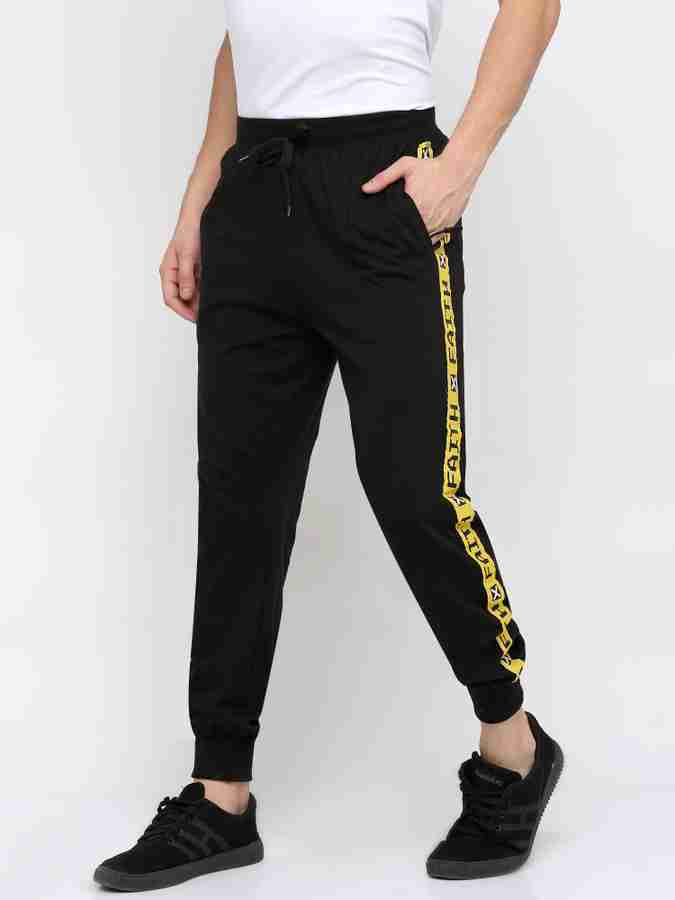 Black yellow track pants sales