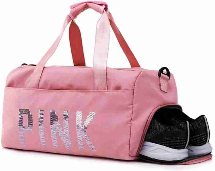 Pink duffle top bag with wheels