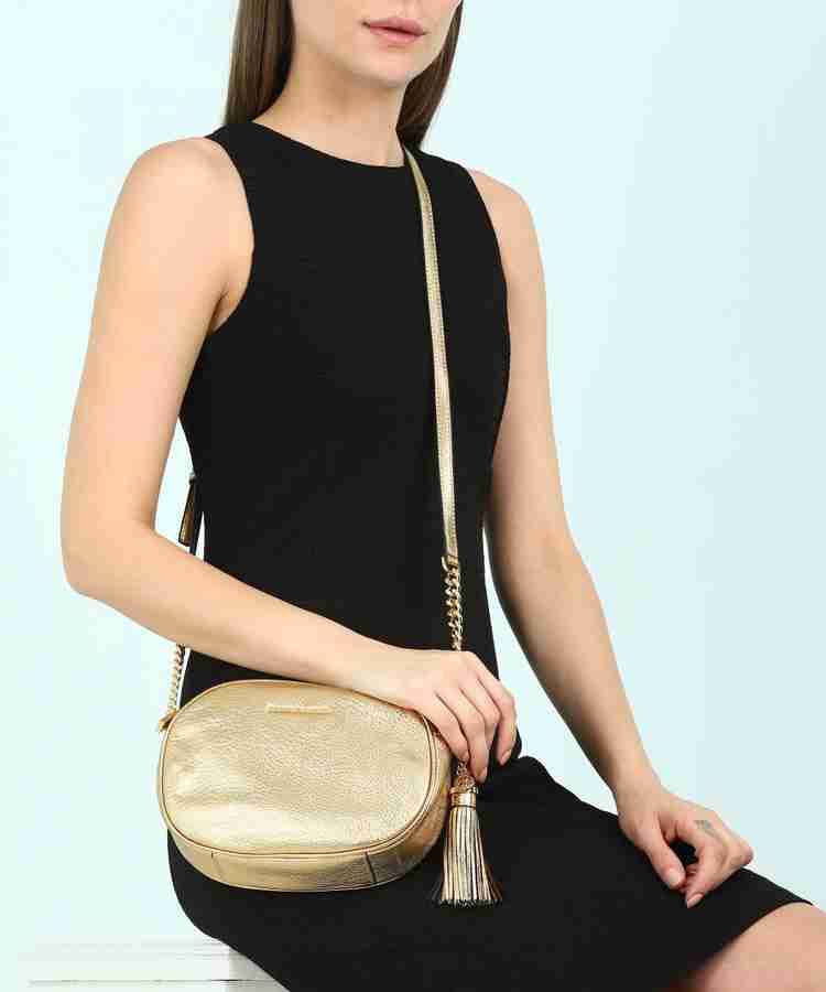 MICHAEL KORS Gold Sling Bag 30S7MGNM2K PALE GOLD Price in India Flipkart