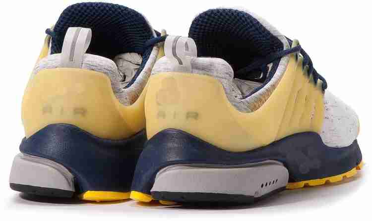 Yellow presto best sale shoes