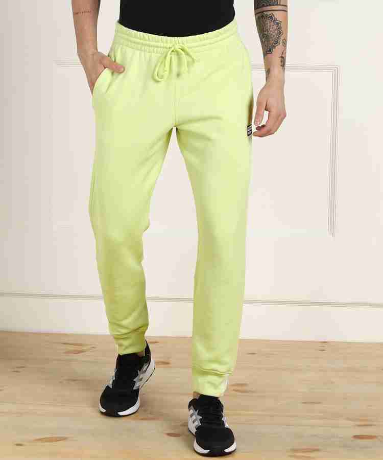 Bright green adidas track pants sale