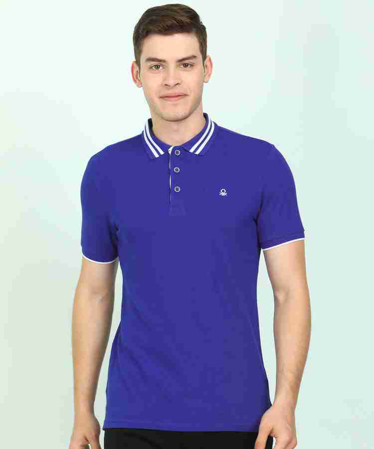 Man utd blue polo shirt discount