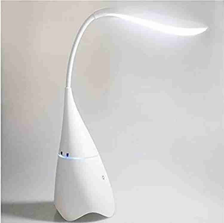 Study lamp with speaker outlet