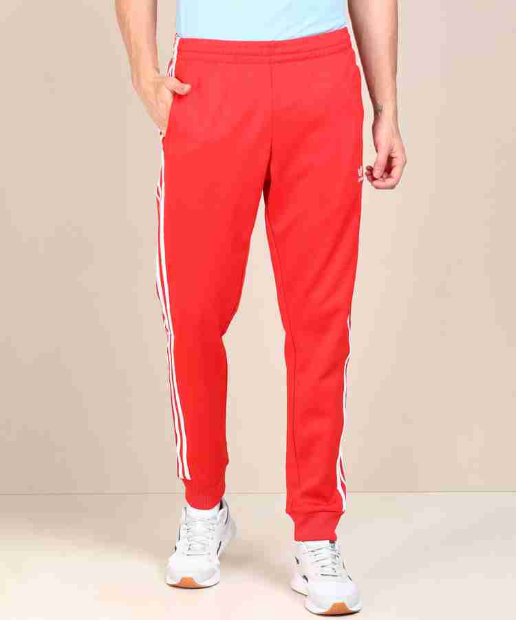 ADIDAS ORIGINALS Solid Men Red Track Pants Buy ADIDAS