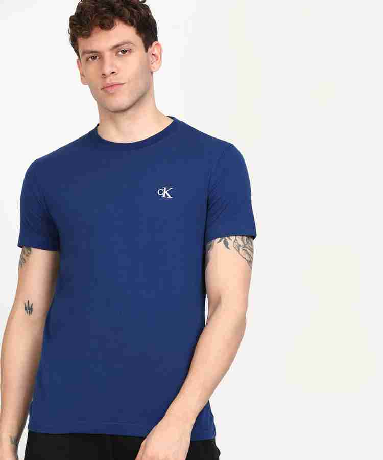 Calvin Klein Jeans Solid Men Round Neck Blue T Shirt Buy Calvin Klein Jeans Solid Men Round Neck Blue T Shirt Online at Best Prices in India Flipkart