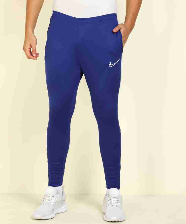 NIKE Solid Men Blue Track Pants - Flipkart