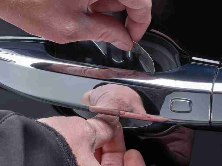 Door handle outlet paint protection film