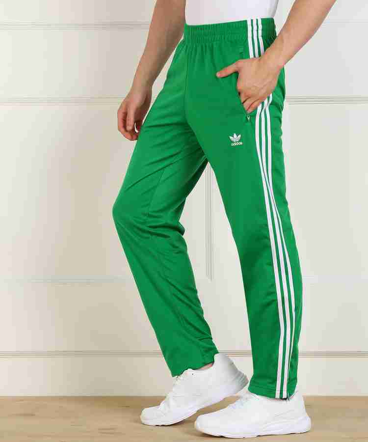 Adidas originals hotsell green tracksuit bottoms