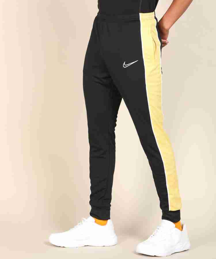 Yellow and black online nike joggers