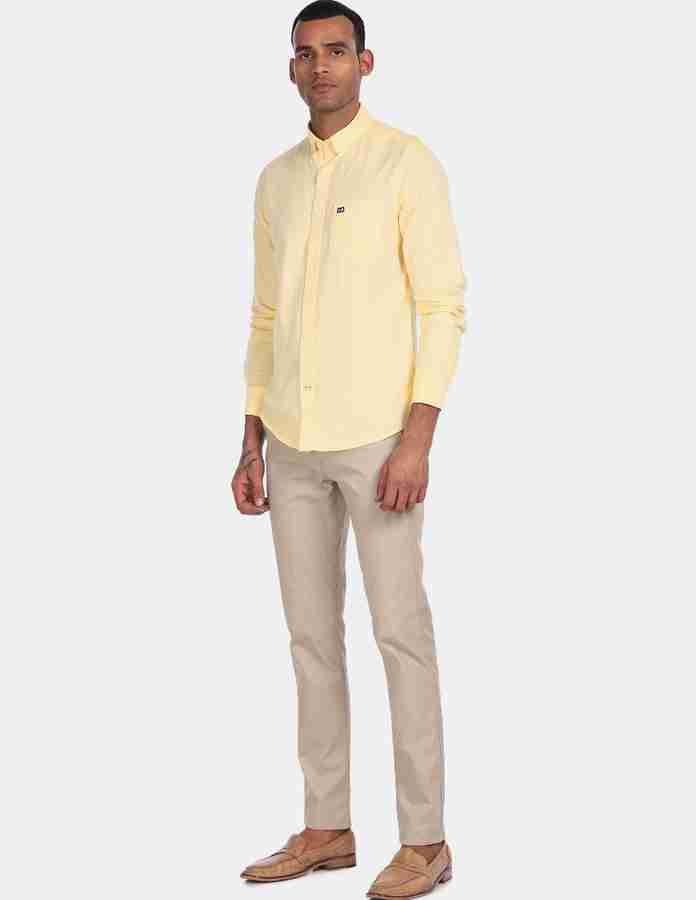 Yellow shirt and khaki hot sale pants